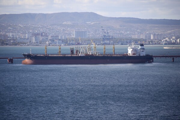 An oil tanker is moored at the Sheskharis complex, part of Chernomortransneft JSC, a subsidiary of Transneft PJSC, in Novorossiysk, Russia, on Oct. 11, 2022. (AP Photo, File)