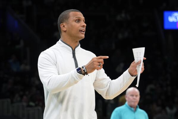 Boston Celtics interim coach Joe Mazzulla shouts from the bench in the first half of a preseason NBA basketball game against the Charlotte Hornets, Sunday, Oct. 2, 2022, in Boston. (AP Photo/Steven Senne)