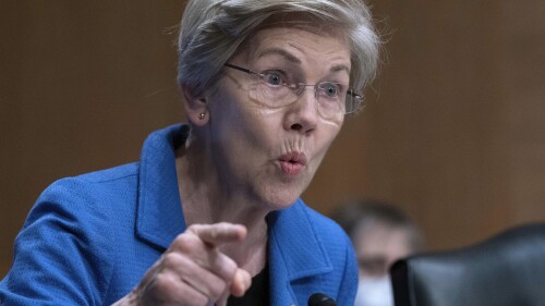 FILE - Mon.  Elizabeth Warren, D-Mass., speaks during the Senate Committee on Banking, Housing and Urban Affairs hearing on oversight of the credit reporting agencies at Capitol Hill in Washington, Thursday, April 27, 2023. A group of Democratic senators is asking the nation's consumer finance watchdog to take action against medical credit cards such as CareCredit, saying use of these cards can result in patients paying much more for their medical care than they should.  (AP Photo/Jose Luis Magana, File)