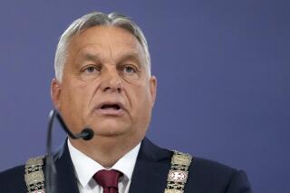 Hungary's Prime Minister Viktor Orban speaks during a news conference with Serbian President Aleksandar Vucic in Belgrade, Serbia, Friday, Sept. 16, 2022. Orban is on a one day working visit to Serbia. (AP Photo/Darko Vojinovic)