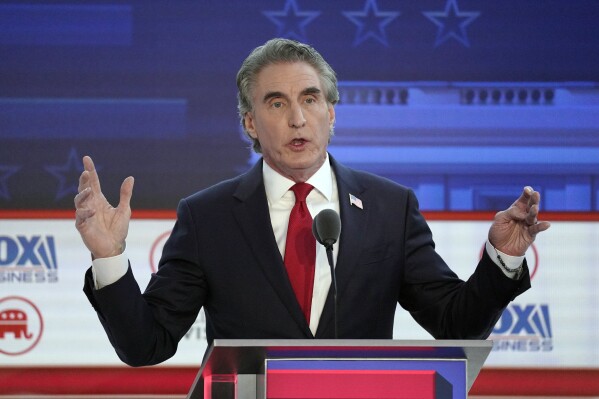 FILE - North Dakota Gov. Doug Burgum speaks during a Republican presidential primary debate hosted by FOX Business Network and Univision, Wednesday, Sept. 27, 2023, at the Ronald Reagan Presidential Library in Simi Valley, Calif. Burgum on Tuesday, Oct. 17, 2023, called a special session of the state's Republican-controlled Legislature to address a major budget bill struck down by the state Supreme Court last month, leaving a hole in state government operations lawmakers are rushing to fill. (AP Photo/Mark J. Terrill, File)