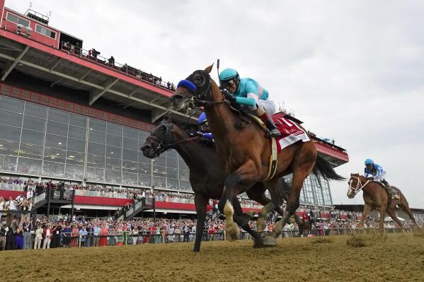Kentucky Derby: Triple Crown-winning jockey back in as 2nd horse scratched  from race