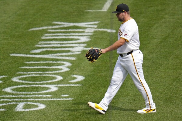 Pittsburgh Pirates relief pitcher David Bednar walks to the dugout after being pulled from the team's baseball game against the Detroit Tigers in the ninth inning in Pittsburgh, Tuesday, April 9, 2024. The Tigers won 5-3. (AP Photo/Gene J. Puskar)