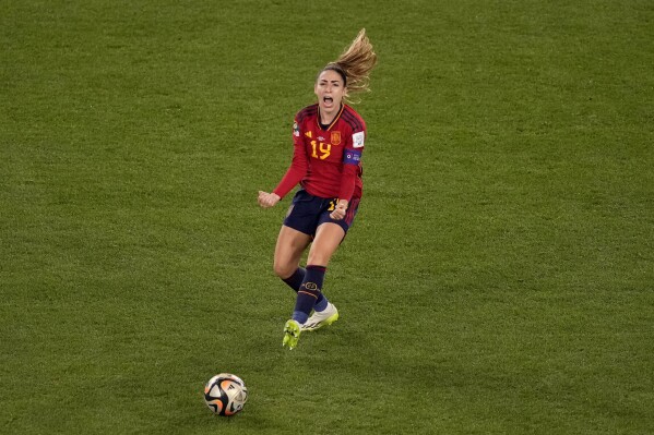 Spain's Olga Carmona celebrates after scoring a goal during the Women's World Cup soccer final between Spain and England at Stadium Australia in Sydney, Australia, Sunday, Aug. 20, 2023. (AP Photo/Mark Baker)