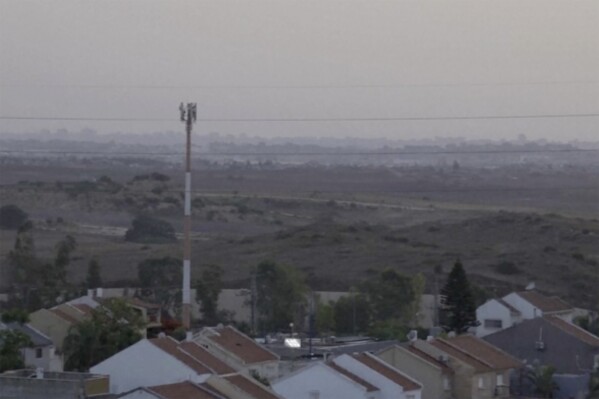 A view of the Gaza Strip skyline from southern Israel near the border with Gaza, Saturday, June 15, 2024. The Israeli army said Saturday that eight soldiers were killed in southern Gaza in the deadliest attack on Israeli forces in months. (AP Photo)