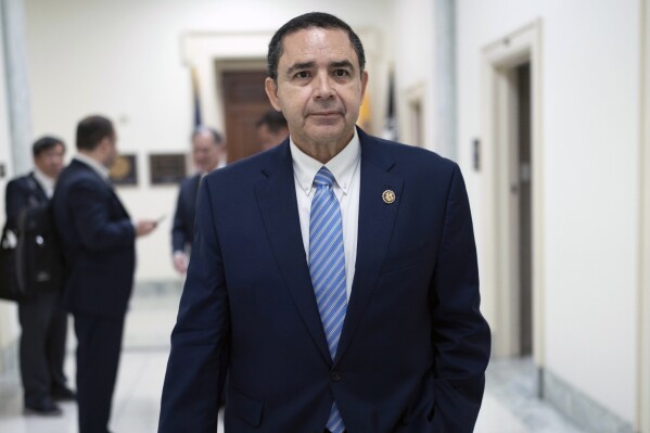 FILE - Rep. Henry Cuellar, D-Texas, walks from his office to the House chamber to vote on Capitol Hill, Wednesday, May 15, 2024, in Washington. During a court hearing, prosecutors and defence attorneys discussed whether classified documents might play a role in the trial of U.S. Rep. Henry Cuellar of Texas. (Ǻ Photo/Jose Luis Magana, file)