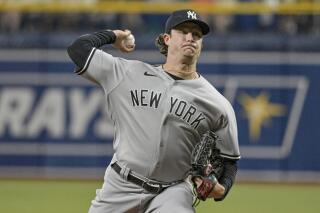 New York Yankees starter Gerrit Cole pitches against the Tampa Bay Rays during the first inning of a baseball game Monday, June 20, 2022, in St. Petersburg, Fla. (AP Photo/Steve Nesius)