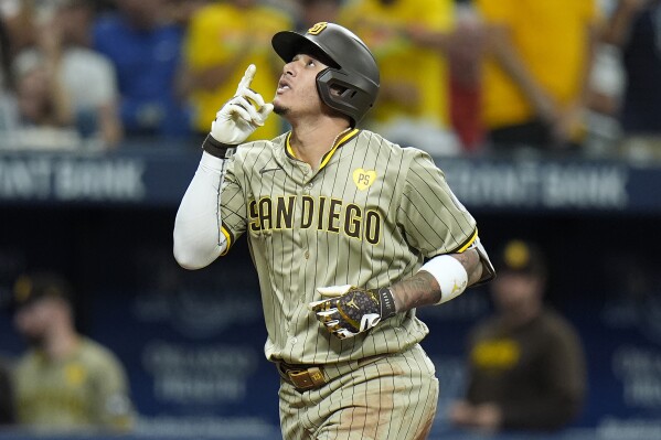 Manny Machado hits 3-run homer and singles twice in the Padres' 13-5 victory over the Rays | AP News