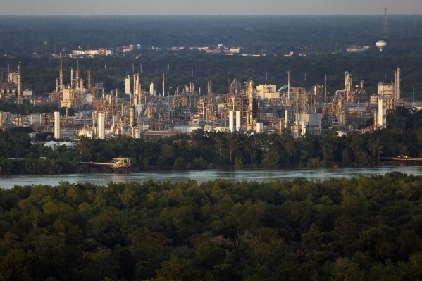 The community of Geismar is seen in the shadow of a chemical and petroleum industrial corridor, that is a known source of ethylene oxide emissions, in Ascension Parish, La., Friday, June 7, 2024. (AP Photo/Gerald Herbert, File)
