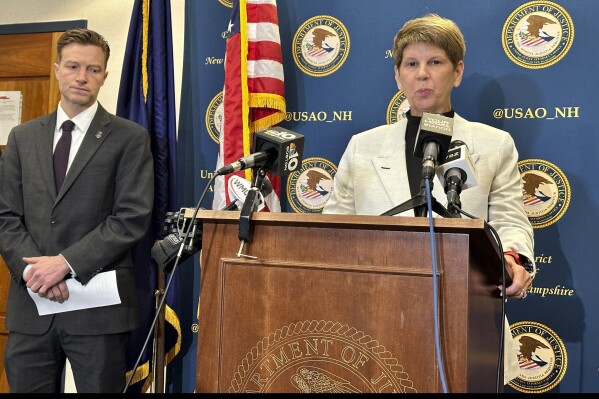 U.S. Attorney Jane Young, righT, announces the arrests of a Keene couple accused of taking sexually explicit photos of a young girl. Young spoke at a news conference in Concord, N.H., on Wednesday, March 20, 2024, along with William Crogan of the Department of Homeland Security. (AP Photo/Holly Ramer)