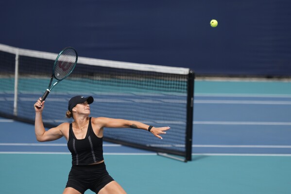 Aryna Sabalenka, of Belarus, hits balls on a practice court at the Miami Open tennis tournament, Wednesday, March 20, 2024, in Miami Gardens, Fla. (AP Photo/Rebecca Blackwell)