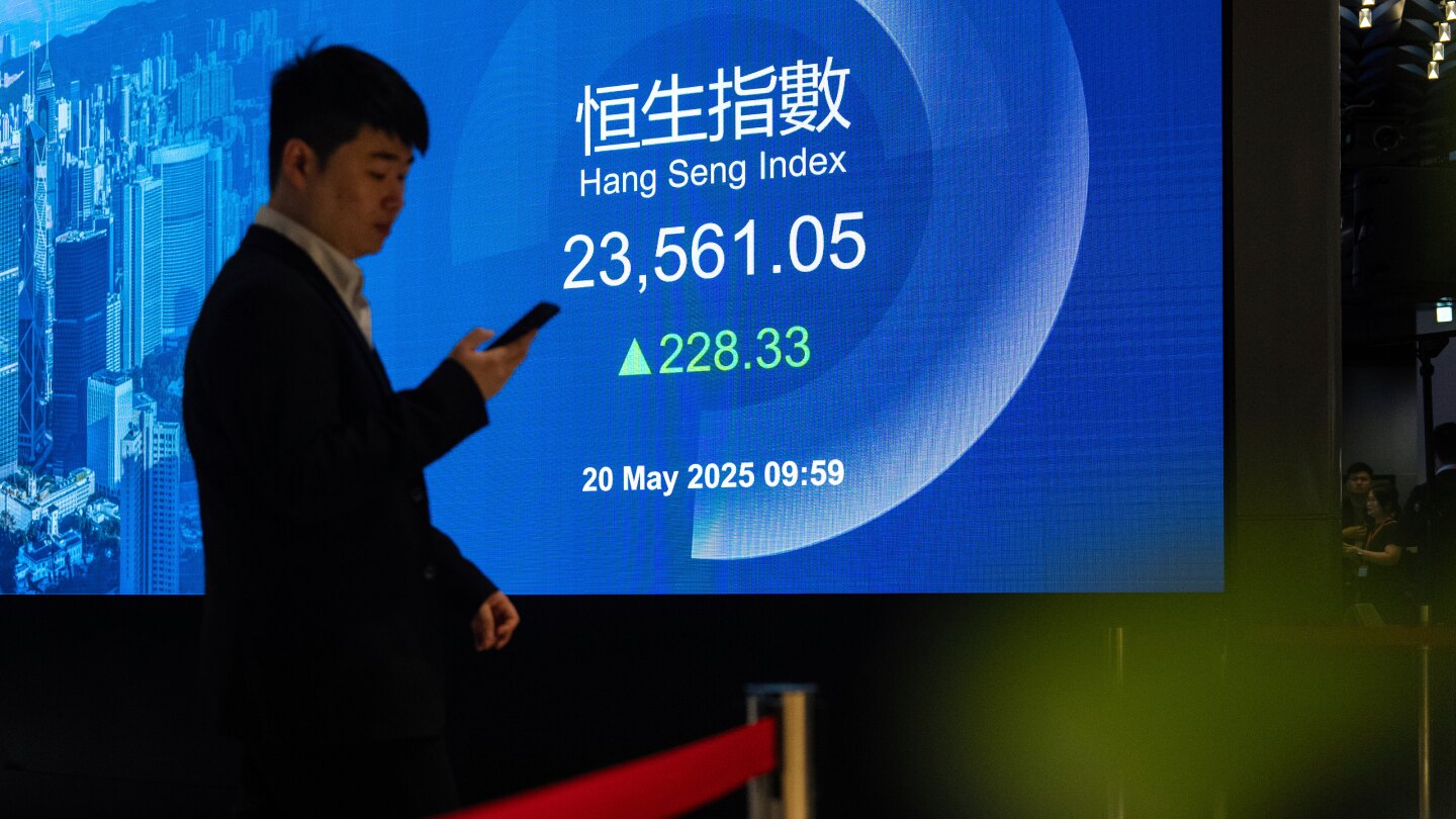 Asian shares advance after China cuts interest rates to boost economy