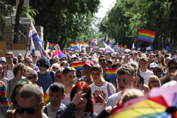 Participants march during the 29th Budapest Pride parade in Budapest, Hungary, Saturday, June 22, 2024. (Robert Hegedus/MTI via AP, File)