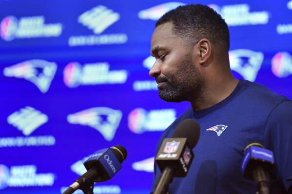 New England Patriots head coach Jerod Mayo departs after answering questions following an NFL football game against the Buffalo Bills, Sunday, Jan. 5, 2025, in Foxborough, Mass. Mayo was fired shortly after the news conference. (AP Photo/Steven Senne)