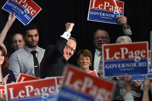 Former Gov. Paul LePage pumps his fist as he walks off the stage at the Augusta Civic Center in Augusta, Maine, Wednesday, Sept. 22, 2021. LePage formally kicked off his campaign for a third term in front of more than a thousand noisy supporters at an indoor arena in the capital city. (Shawn Patrick Ouellette/Portland Press Herald via AP)