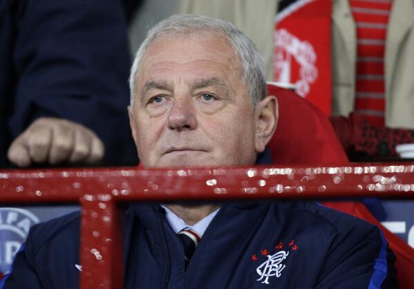 FILE - In this Tuesday Sept. 14, 2010 file photo, Rangers' manager Walter Smith, during the first leg of their Group C Champions League soccer match Manchester United , Old Trafford, Manchester, England. Scottish soccer coaching great Walter Smith has died. He was 73. Smith won 10 league titles with Rangers over two spells and also led the national team. Rangers announced Smith's death and chairman Douglas Park says the “club legend” had been battling illness. Smith won seven straight Scottish league titles as well as three Scottish Cups and three Scottish League Cups in his first spell at Rangers from 1991-98. He returned in 2007 and won three straight league titles from 2009, five domestic cups and guided Rangers to the UEFA Cup final in 2008. He also coached Everton in the Premier League. (AP Photo/Jon Super, File)