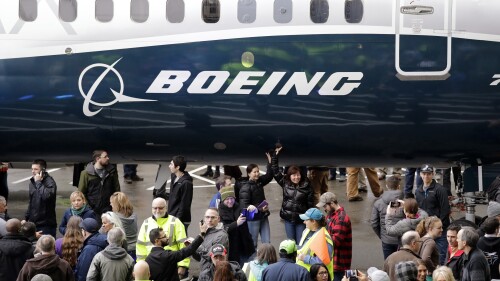 FILE- In this Feb. 5, 2018, file photo a Boeing 737 MAX 7 is displayed during a debut for employees and media of the new jet in Renton, Wash. The Boeing Company reports earnings on Wednesday, July 26, 2023. (AP Photo/Elaine Thompson, File)