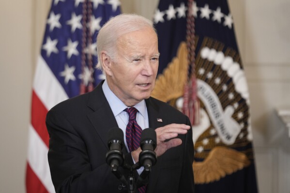 President Joe Biden speaks during an event on protecting retirement security against what are commonly referred to as "junk fees" in the State Dining Room of the White House, Tuesday, Oct. 31, 2023, in Washington. (AP Photo/Andrew Harnik)