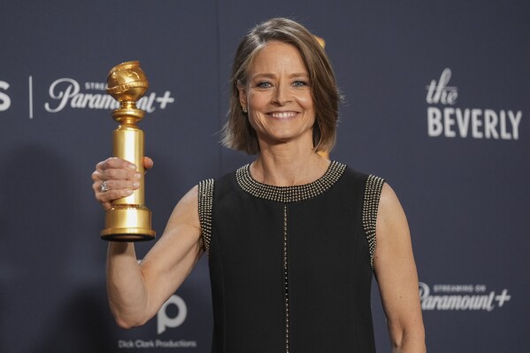 Jodie Foster poses in the press room with the award for best performance by a female actor in a limited series, anthology series, or a motion picture made for television for "True Detective: Night Country" during the 82nd Golden Globes on Sunday, Jan. 5, 2025, at the Beverly Hilton in Beverly Hills, Calif. (AP Photo/Chris Pizzello)