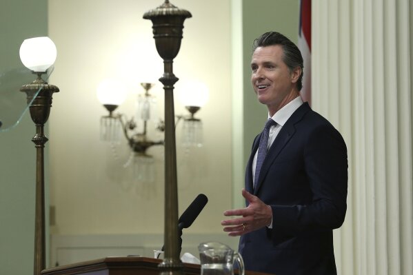
              File - In this Feb. 12, 2019 file photo, California Gov. Gavin Newsom delivers his first state of the state address to a joint session of the legislature at the Capitol in Sacramento, Calif.  Newsom devoted part of his first State of the State address to attacking President Donald Trump's positions on illegal immigration, declaring, "This border emergency is nothing more than a manufactured crisis and California will not be part of this political theater." (AP Photo/Rich Pedroncelli, File)
            
