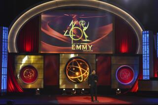 FILE - Host Mario Lopez appears on stage at the 46th annual Daytime Emmy Awards in Pasadena, Calif., on May 5, 2019. The stars and creators of daytime television are gathering in person to hand out trophies live at the Daytime Emmys on Friday. (Photo by Chris Pizzello/Invision/AP, File)