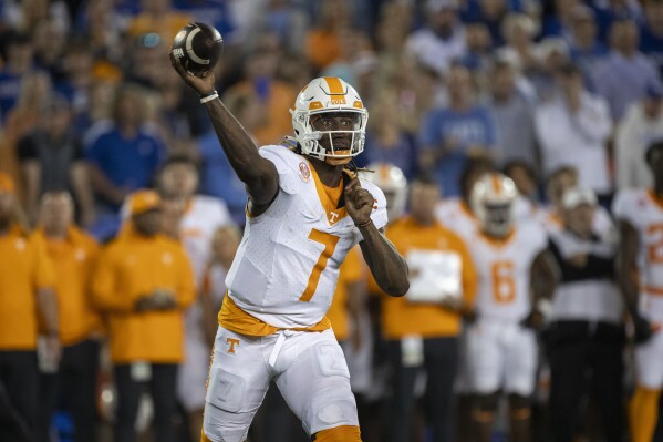 Tennessee quarterback Joe Milton III (7) looks to throw during the second half of an NCAA college football game against Kentucky in Lexington, Ky., Saturday, Oct. 28, 2023. (AP Photo/Michelle Haas Hutchins)