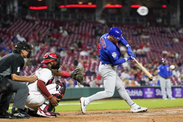 Chicago Cubs' Nico Hoerner hits a solo home run during the seventh inning of the team's baseball game against the Cincinnati Reds on Tuesday, Oct. 4, 2022, in Cincinnati. (AP Photo/Jeff Dean)