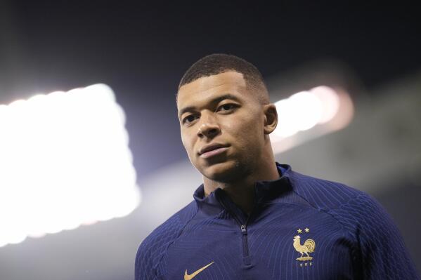 France's Kylian Mbappe looks on during a training session at the Jassim Bin Hamad stadium in Doha, Qatar, Friday, Dec. 16, 2022. France will play against Argentina during their World Cup final soccer match on Dec. 18. (AP Photo/Christophe Ena)