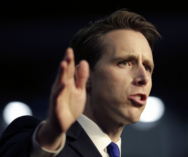 
              Republican Senate candidate Josh Hawley waves as he comes onto the stage during a rally hosted by the American Conservative Union Friday, Nov. 2, 2018, in Kansas City, Mo. Hawley is challenging Missouri Democratic Sen. Claire McCaskill. (AP Photo/Charlie Riedel)
            