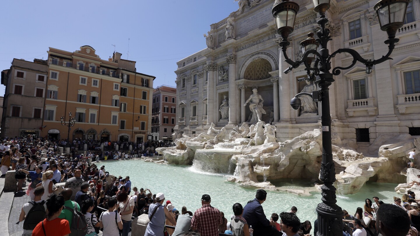 ROME (AP) — Seemingly every tourist in Rome knows the key to returning to the Eternal City is to toss a coin into the Trevi Fountain  and make a wis