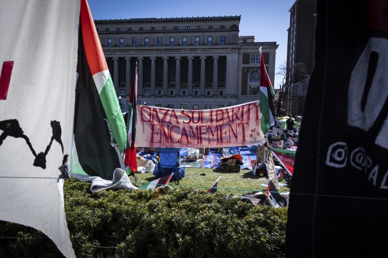 FILE - A sign that reads, "Gaza Solidarity Encampment," is seen during the pro-Palestinian protest at the Columbia University campus in New York, Monday April 22, 2024. (AP Photo/Stefan Jeremiah, File)