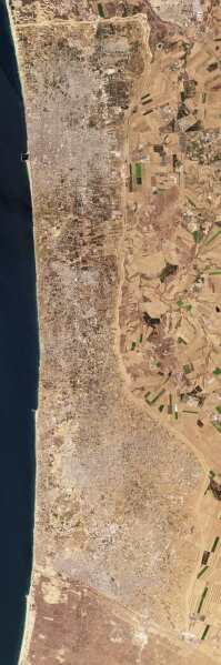 This satellite photo from Planet Labs PBC shows the Gaza Strip on Aug. 9, 2023. Satellite photos show new demolition along a 1-kilometer-deep path on the Gaza Strip's border with Israel, according an analysis by The Associated Press and expert reports. The destruction comes as Israel has said it wants to establish a buffer zone there, further tearing away at land the Palestinians want for a state over international objections. (Planet Labs PBC via AP)