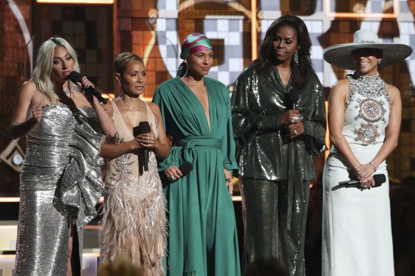 
              Lady Gaga, from left, Jada Pinkett Smith, Alicia Keys, Michelle Obama and Jennifer Lopez speak at the 61st annual Grammy Awards on Sunday, Feb. 10, 2019, in Los Angeles. (Photo by Matt Sayles/Invision/AP)
            