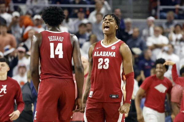 Alabama forward Nick Pringle (23) reacts after they beat Auburn in an NCAA college basketball game, Saturday, Feb. 11, 2023, in Auburn, Ala. (AP Photo/Butch Dill)