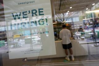 A signs announcing they are hiring hangs in the window of a restaurant in the Greenwich Village neighborhood of Manhattan in New York, Tuesday, May 4, 2021. Some restaurants in New York City are starting to hire employees now that they can increase their indoor dining to 75% of capacity starting May 7. (AP Photo/Mary Altaffer)
