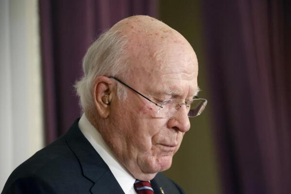 Sen. Patrick Leahy, D-Vt., looks down as he speaks during a news conference at the Vermont State House to announce he will not seek re-election, Monday, Nov. 15, 2021, in Montpelier, V.T. (AP Photo/Mary Schwalm)