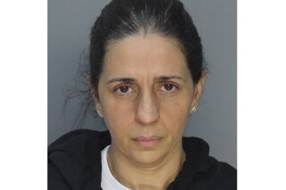 This photo provided by Miami-Dade Corrections and Rehabilitation shows Patricia Ripley.  Officials say Ripley faked her son's abduction and instead led him to the canal where he drowned. Court records show 45-year-old Patricia Ripley is facing a first-degree murder charge. Her son was 9-year-old Alejandro Ripley and was autistic.  The boy's body was found early Friday, May 22, 2020 at a golf course canal. (Miami-Dade Corrections and Rehabilitation via AP)