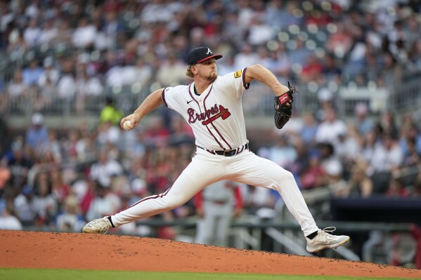 Atlanta Braves pitcher Spencer Schwellenbach (56) delivers in the third inning of a baseball game against the Washington Nationals, Wednesday, May 29, 2024, in Atlanta. (AP Photo/Brynn Anderson)