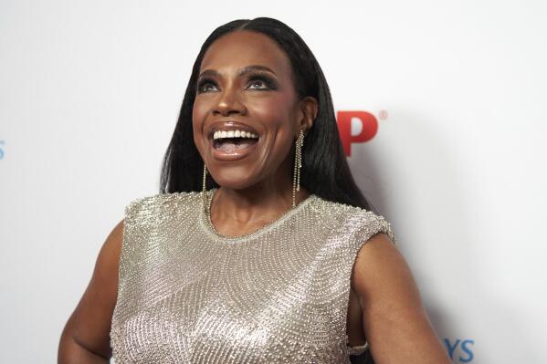 FILE - Sheryl Lee Ralph arrives at AARP's 21st annual Movies for Grownups Awards on Saturday, Jan. 28, 2023, at the Beverly Wilshire, A Four Seasons Hotel in Beverly Hills, Calif. Ralph is living a career dream: The “Abbott Elementary” star won her first-ever Emmy in 2022 and will lend her powerful vocals as a Super Bowl pregame performer this weekend, Sunday, Feb. 12. (Photo by Allison Dinner/Invision/AP, File)