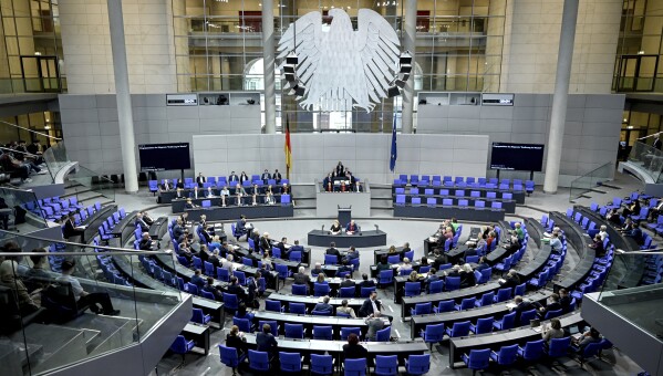 Members of the Bundestag debate during the 157th session of the Bundestag, in Berlin Thursday, March 14, 2024. Topics include the vote on the delivery of the Taurus cruise missile to Ukraine and a debate on the Citizens' Council's recommendations on food policy, the election of a federal police commissioner and the reform of the Federal Police Act. (Britta Pedersen/dpa via AP)