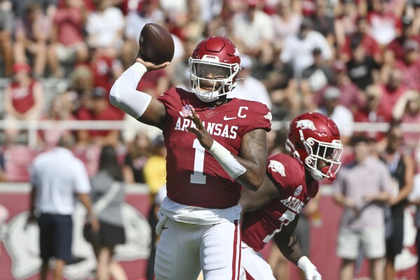 Arkansas quarterback KJ Jefferson (1) throws a pass against Kent State during the first half of an NCAA college football game Saturday, Sept. 9, 2023, in Fayetteville, Ark. (AP Photo/Michael Woods)
