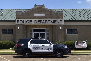 This image provided by The Tate Record shows a Senatobia Police vehicle in front of the Senatobia, Miss., Police Department on Jan. 27, 2021. The mother of a 10-year-old child who was sentenced by a Mississippi judge to three months’ probation and a book report for urinating in public, has refused to sign his probation agreement and will ask for the charge against her son to be dismissed, the family's attorney announced Tuesday, Dec. 19, 2023. (The Tate Record via AP)