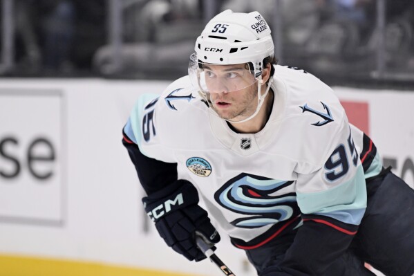 Seattle Kraken left wing Andre Burakovsky (95) skates against the Los Angeles Kings during the first period of an NHL hockey game in Los Angeles, Nov. 23, 2024. (AP Photo/Alex Gallardo, File)