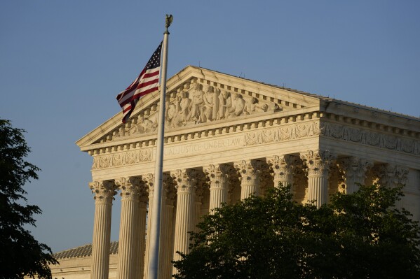 File - The Supreme Court is seen on Friday, April 21, 2023, in Washington. The U.S. Supreme Court will hear arguments Wednesday in a case that could determine whether doctors can provide abortions to pregnant women with medical emergencies in states that enact abortion bans. (AP Photo/Alex Brandon, File)