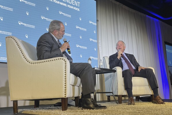 Nevada Independent CEO and editor Jon Ralston, left, and Republican Gov. Joe Lombardo, right, speak during The Nevada Independent's 