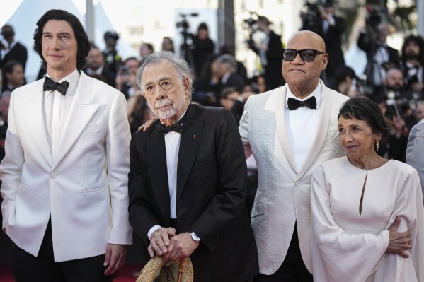 Adam Driver, from left, director Francis Ford Coppola, Laurence Fishburne and Kathryn Hunter pose for photographers upon arrival at the premiere of the film 'Megalopolis' at the 77th international film festival, Cannes, southern France, Thursday, May 16, 2024. (Photo by Scott A Garfitt/Invision/AP)