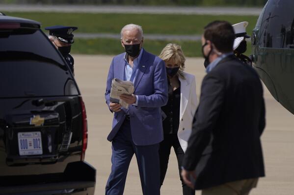 President Joe Biden and first lady Jill Biden walk to a motorcade vehicle after stepping off Marine One at Delaware Air National Guard Base in New Castle, Del., Saturday, April 24, 2021. The Bidens are spending the weekend at their home in Delaware. (AP Photo/Patrick Semansky)