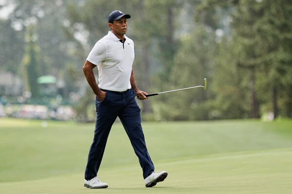 Tiger Woods walks on the first hole during the first round of the Masters golf tournament at Augusta National Golf Club on Thursday, April 6, 2023, in Augusta, Ga. (AP Photo/David J. Phillip, File)