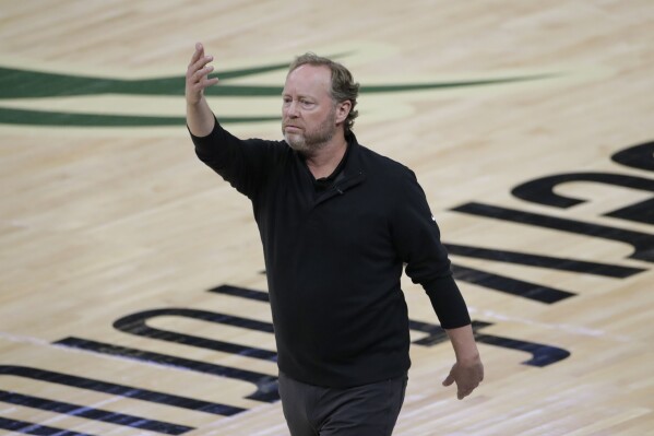 FILE - Milwaukee Bucks coach Mike Budenholzer directs the team during the first half against the Phoenix Suns in Game 4 of basketball's NBA Finals on July 14, 2021, in Milwaukee. Budenholzer has agreed to coach the Suns, according to multiple reports, as the franchise turns to the man who beat them in the 2021 NBA Finals. Budenholzer replaces Frank Vogel, who was fired Thursday, May 9, 2024, after one season. (AP Photo/Aaron Gash, File)