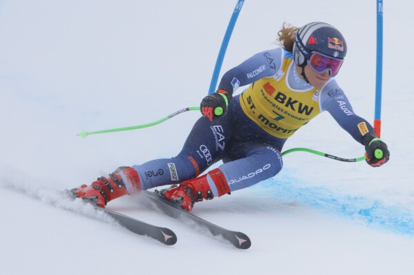 Italy's Sofia Goggia speeds down the course during an alpine ski, women's World Cup super G race, in St. Moritz, Switzerland, Friday, Dec. 8, 2023. (AP Photo/Giovanni Pizzato)